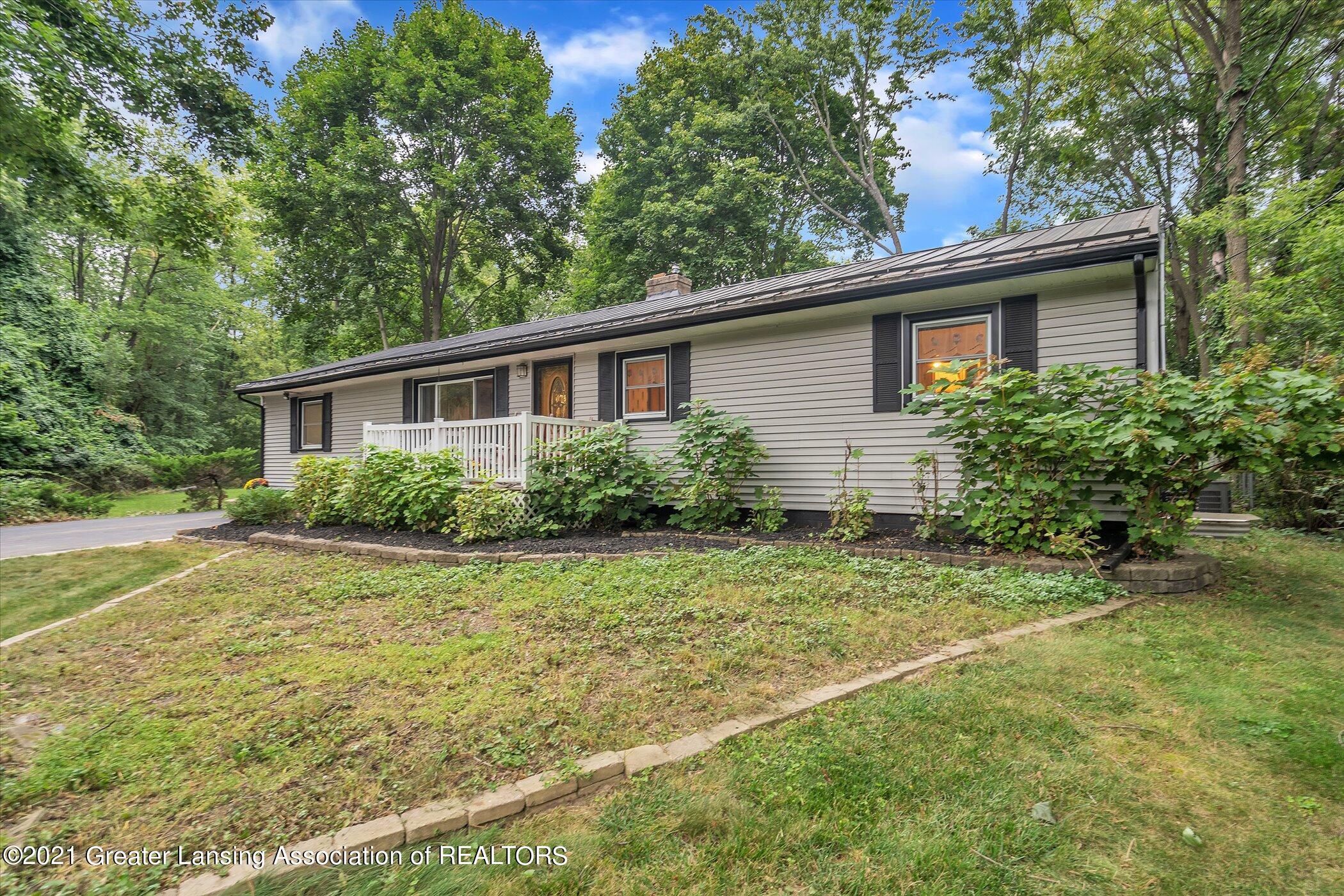 2821 North Aurelius Road Lansing, MI 48910 - Photo 4 of 48 04-2821 Aurelius Rd-Windowstill-Real-Est