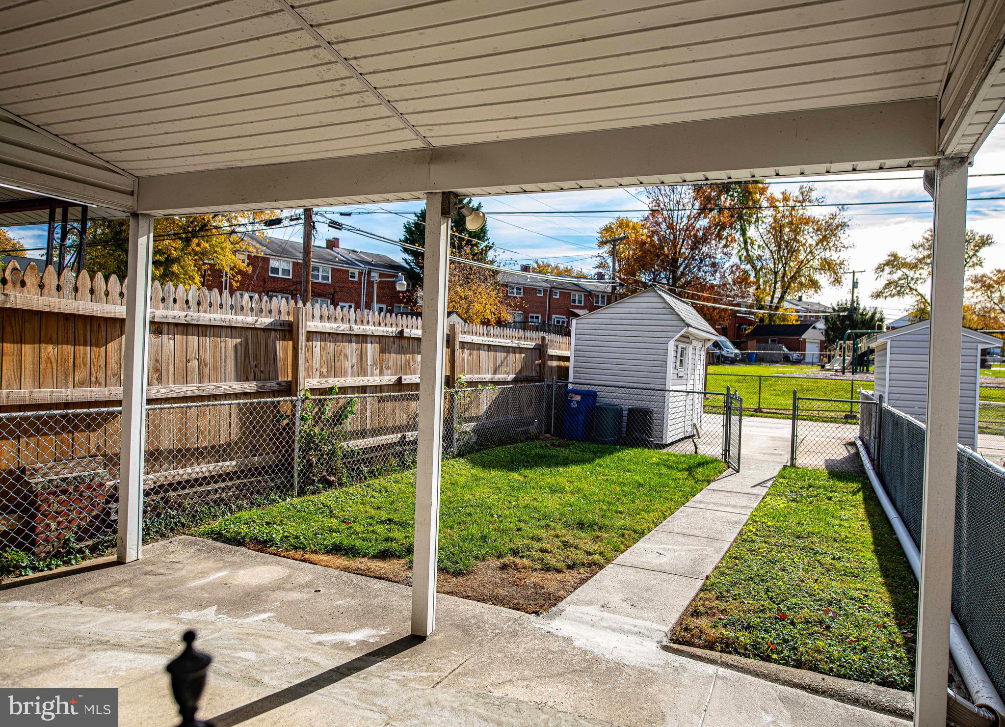 8559 Morven Road Baltimore, MD 21234 - Photo 21 of 27 a front view of a house with a yard