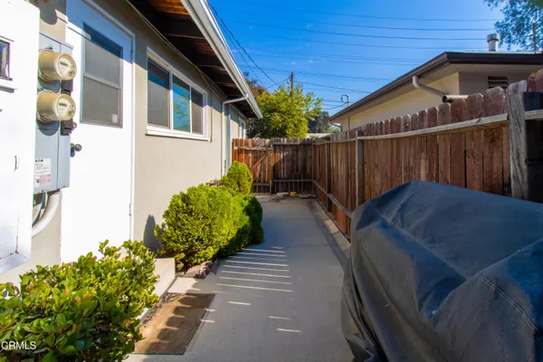 a view of a pathway with a house