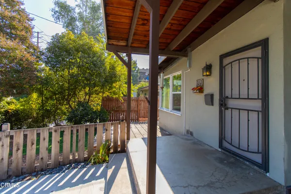 a view of porch with wooden floor of outdoor seating