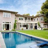 a view of a house with a swimming pool