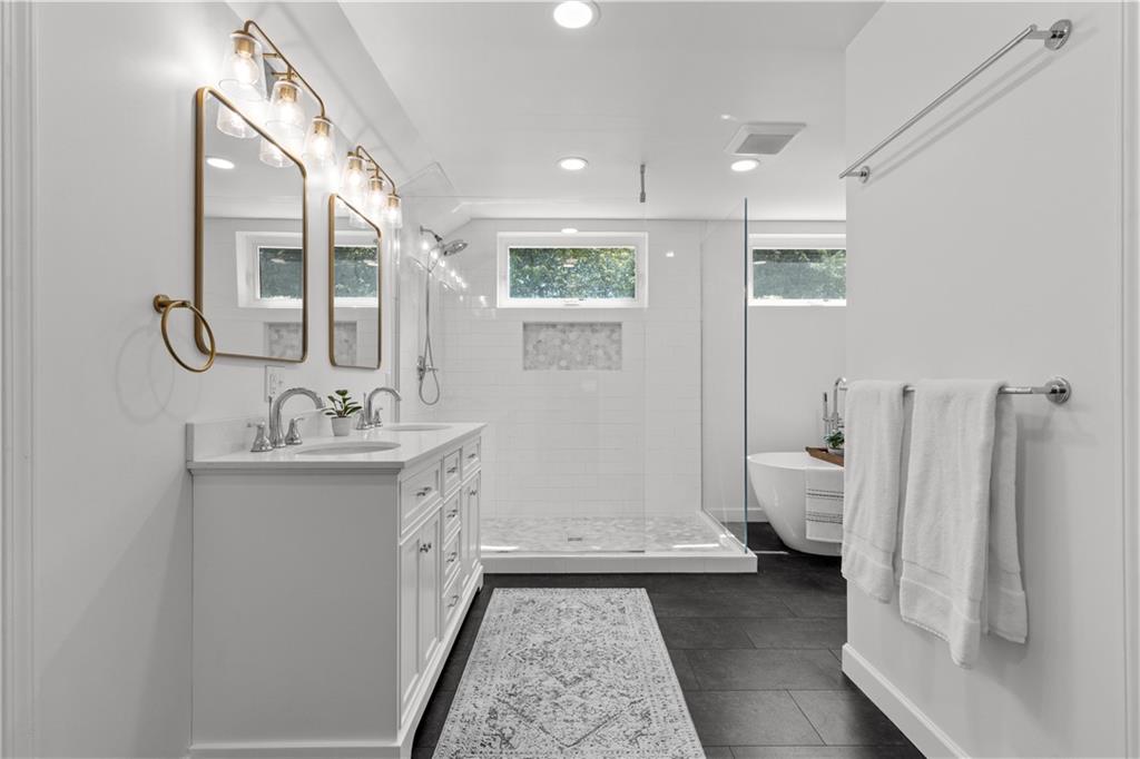 3566 Green Garden Road Aliquippa, PA 15001 - Photo 24 of 50 a bathroom with a double vanity sink a mirror and a toilet