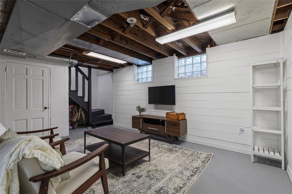 3566 Green Garden Road Aliquippa, PA 15001 - Photo 34 of 50 a bedroom with furniture and a flat screen tv