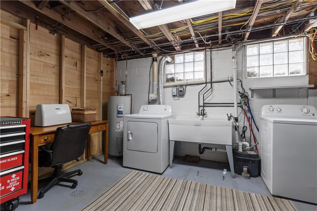 3566 Green Garden Road Aliquippa, PA 15001 - Photo 36 of 50 a view of a storage & utility room with washer and dryer