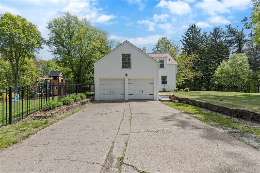3566 Green Garden Road Aliquippa, PA 15001 - Photo 47 of 50 a view of a house with a backyard