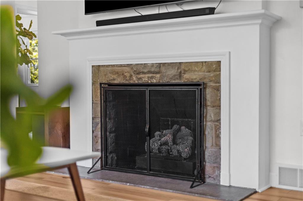 3566 Green Garden Road Aliquippa, PA 15001 - Photo 9 of 50 a living room with a fireplace