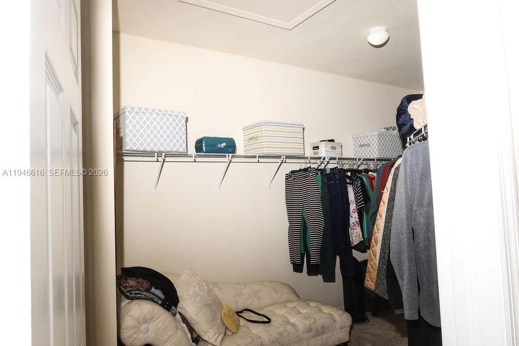 11601 Southwest 232nd Lane Homestead, FL 33032 - Photo 13 of 32 a view of a walk in closet