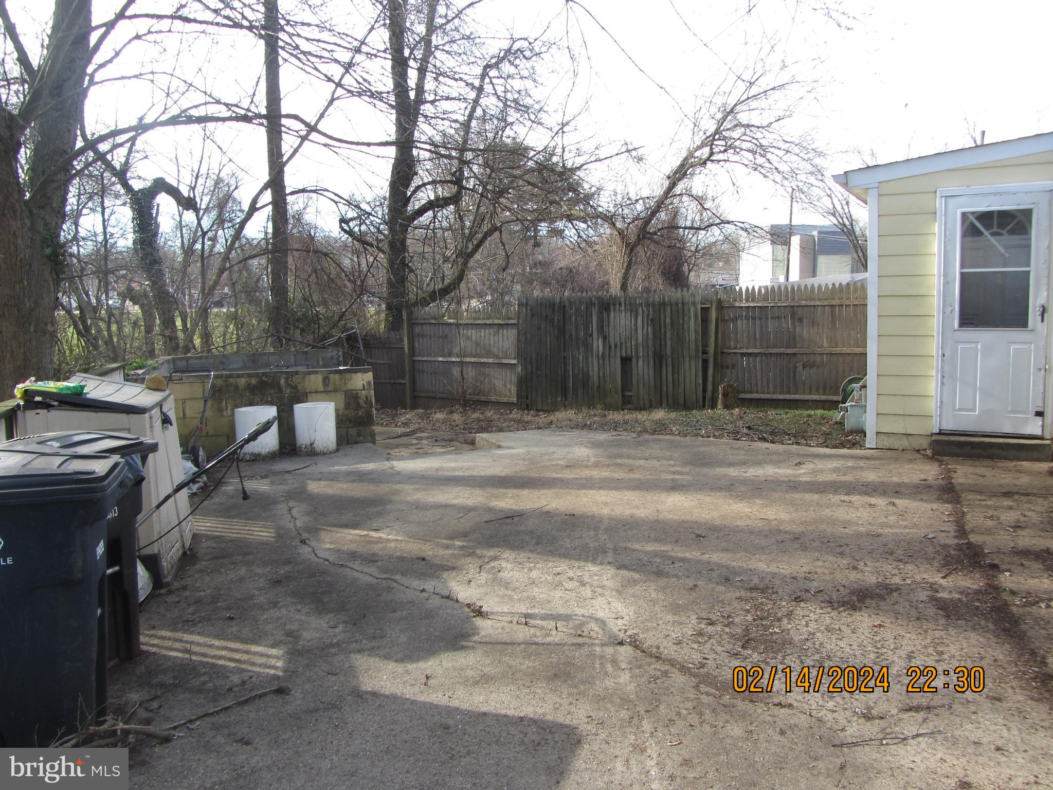 7801 Greenleaf Road Hyattsville, MD 20785 - Photo 12 of 51 a backyard of a house with table and chairs