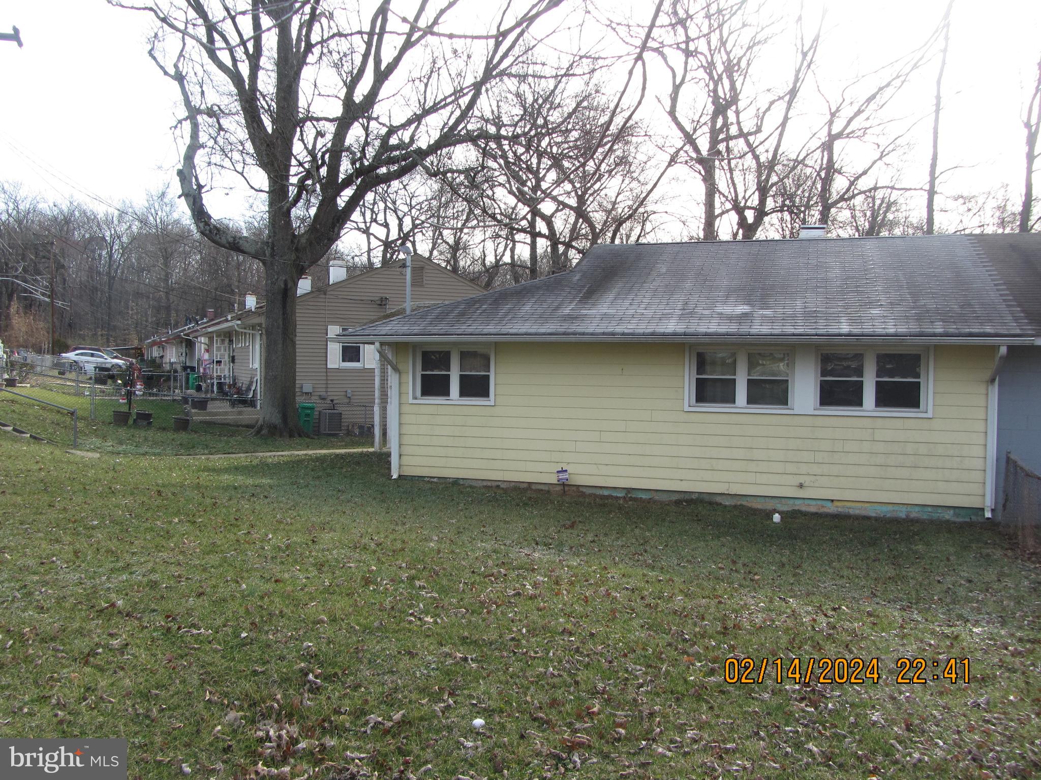 7801 Greenleaf Road Hyattsville, MD 20785 - Photo 13 of 51 a view of a house with a yard
