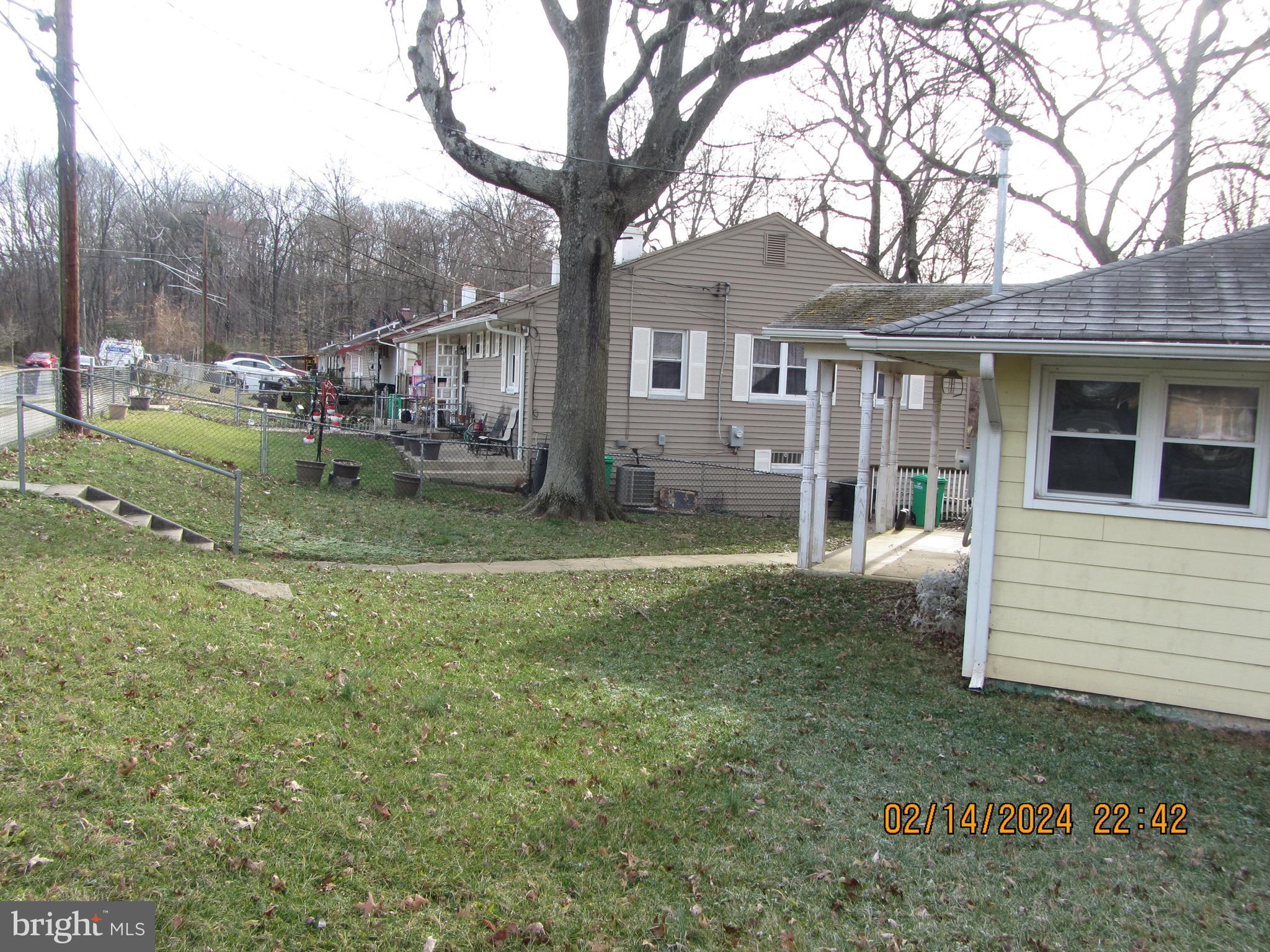 7801 Greenleaf Road Hyattsville, MD 20785 - Photo 17 of 51 a view of a house with a yard