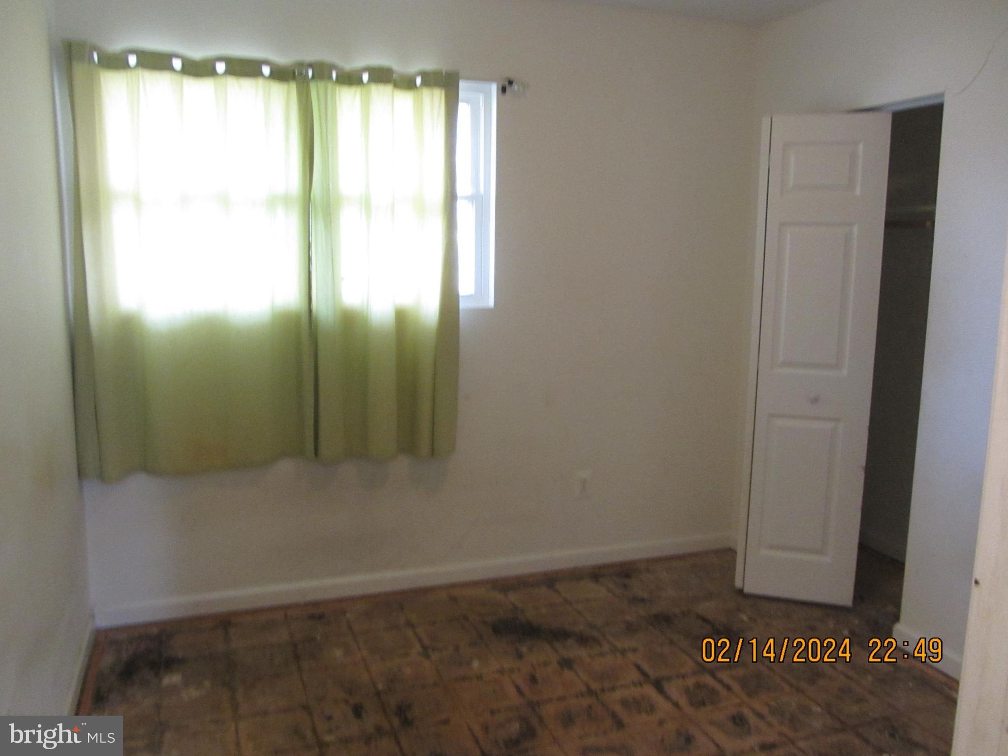 7801 Greenleaf Road Hyattsville, MD 20785 - Photo 35 of 51 a view of an empty room and window