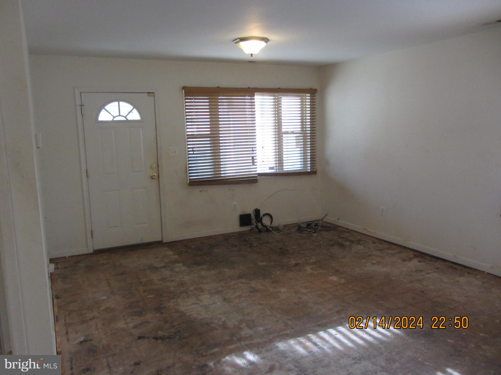 7801 Greenleaf Road Hyattsville, MD 20785 - Photo 40 of 51 an empty room with windows