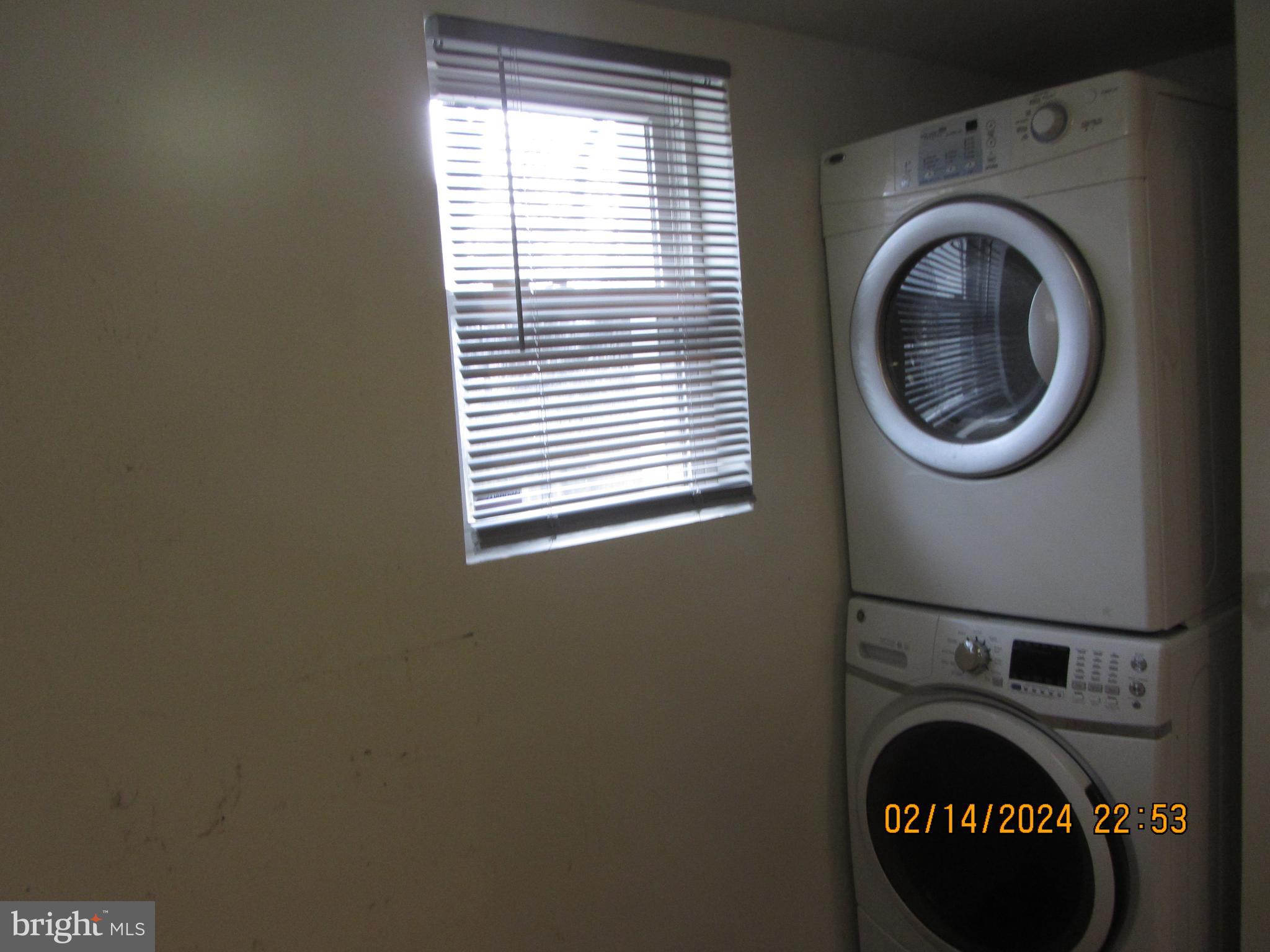 7801 Greenleaf Road Hyattsville, MD 20785 - Photo 45 of 51 a close view of a utility room with dryer and washer