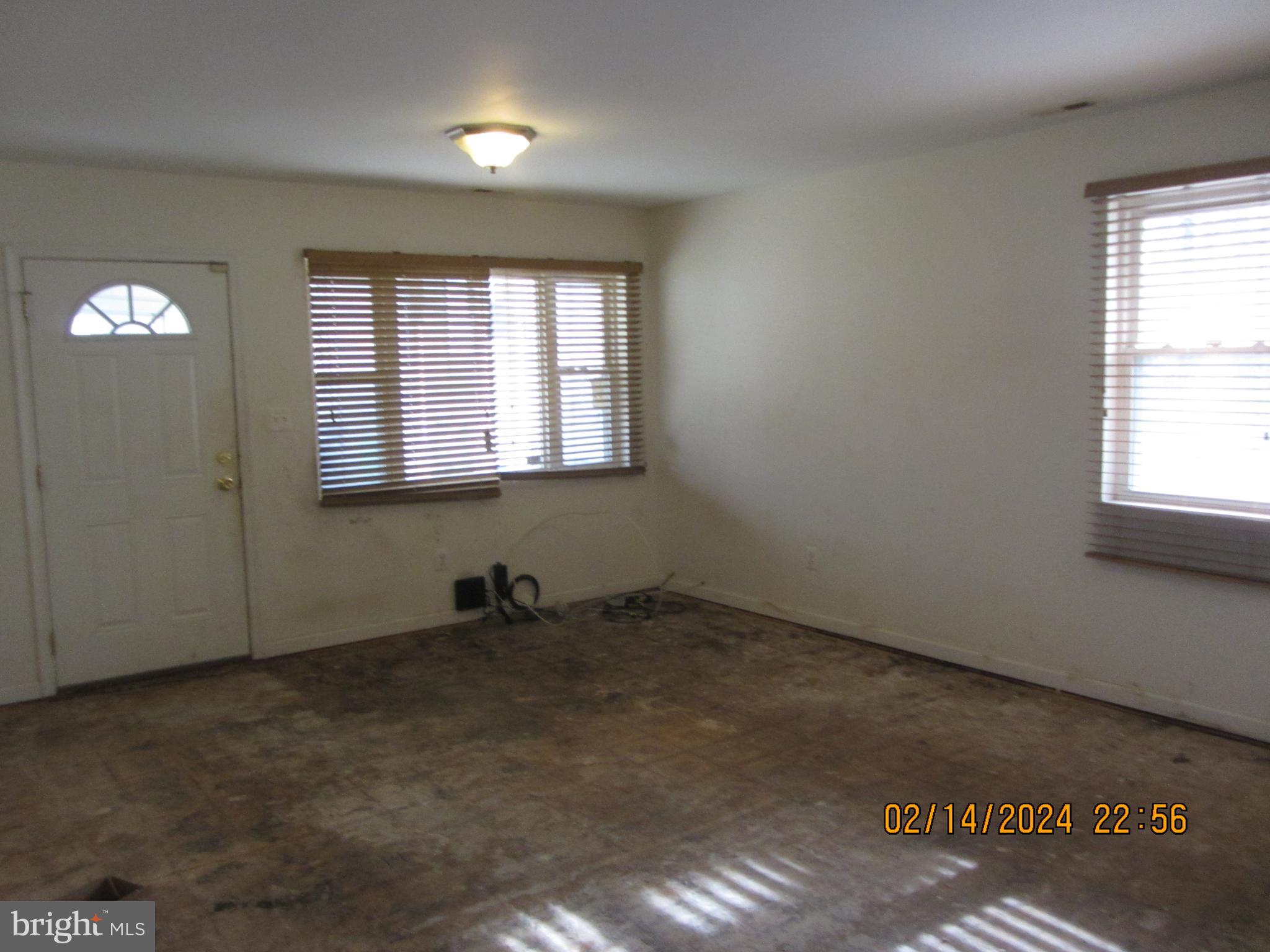 7801 Greenleaf Road Hyattsville, MD 20785 - Photo 48 of 51 an empty room with windows