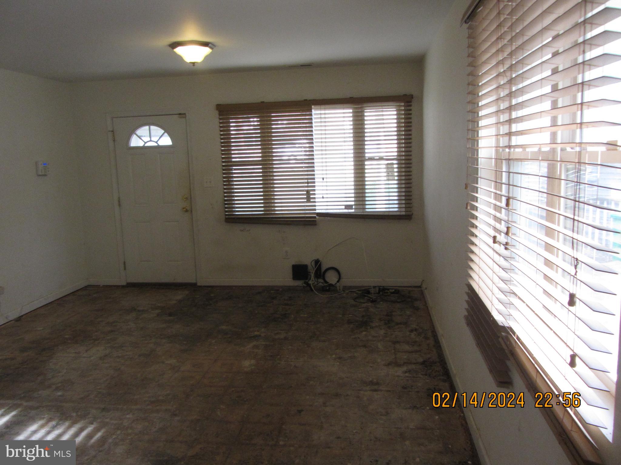 7801 Greenleaf Road Hyattsville, MD 20785 - Photo 49 of 51 a view of an empty room with a window