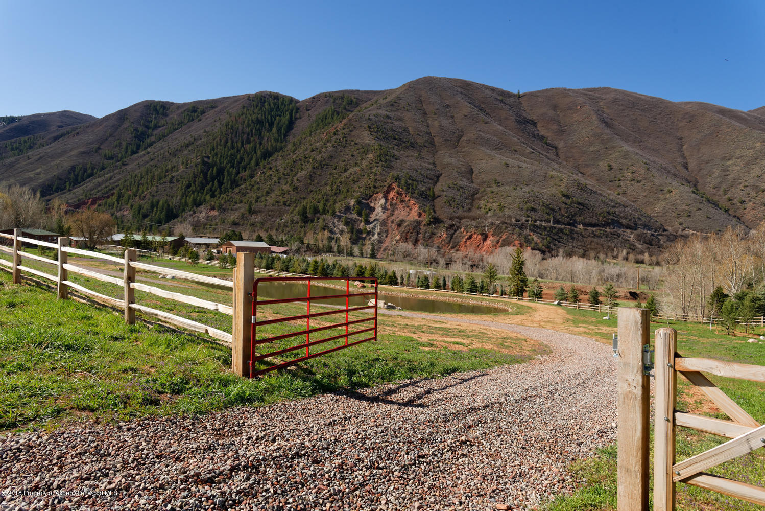 186 Hoaglund Ranch Road Basalt, CO 81621 - Photo 10 of 38 Hoaglund Ranch gate to pond