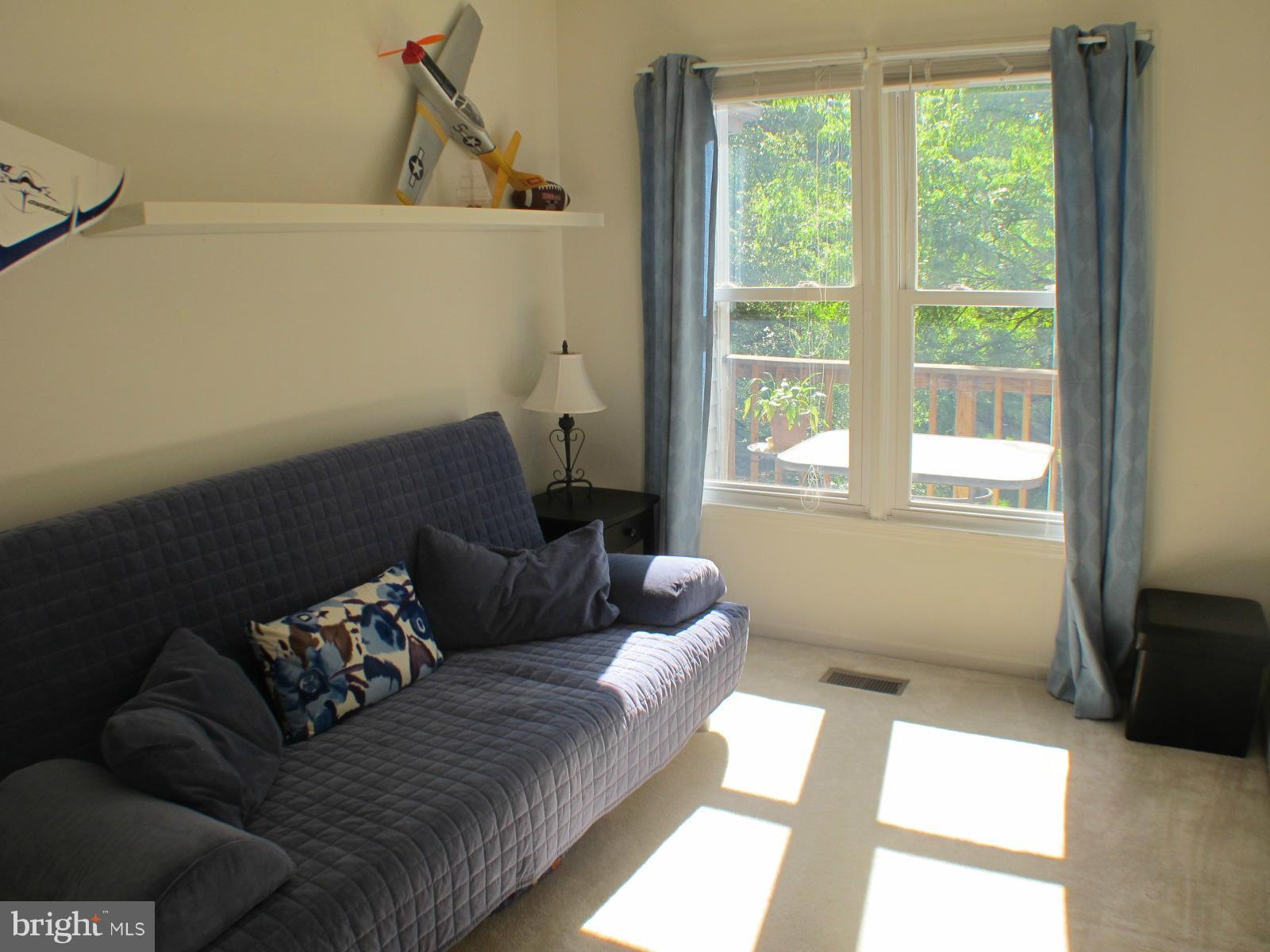 6002 Rabbit Hill Court Centreville, VA 20121 - Photo 23 of 29 a living room with furniture and a window