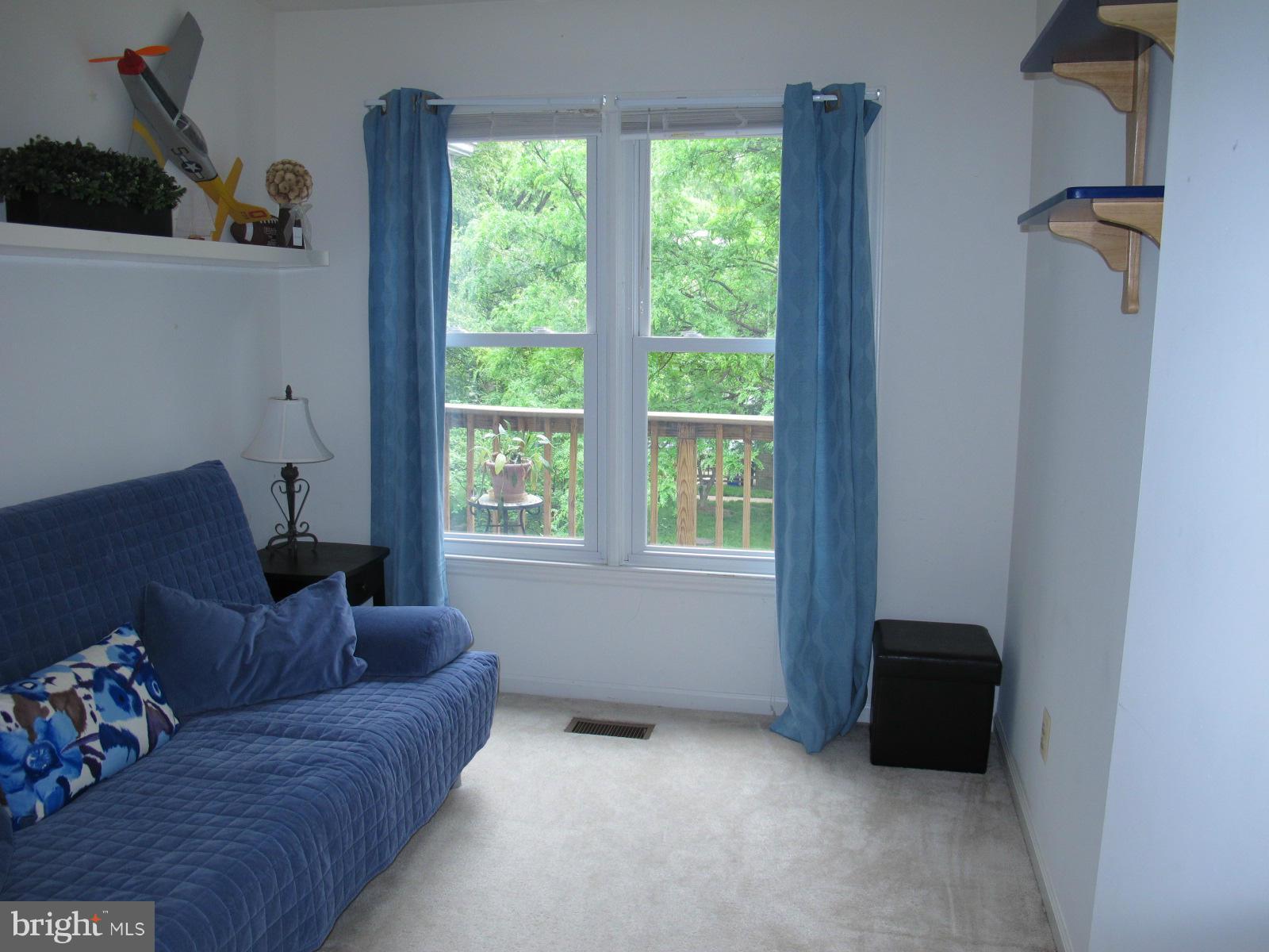 6002 Rabbit Hill Court Centreville, VA 20121 - Photo 24 of 29 a living room with furniture and a window