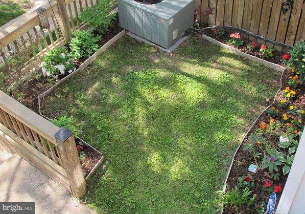 6002 Rabbit Hill Court Centreville, VA 20121 - Photo 26 of 29 a view of a backyard with pathway