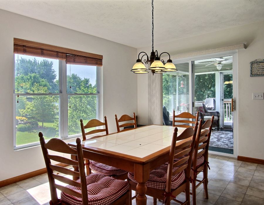 221 Lake Summerset Road Davis, IL 61019 - Photo 8 of 25 a view of a dining room with furniture window and outside view