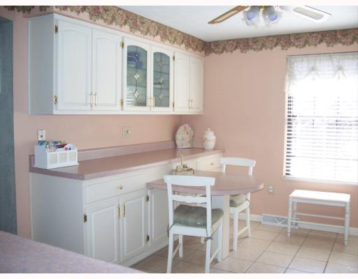 128 Old English Road Pittsburgh, PA 15237 - Photo 6 of 13 Kitchen. The kitchen also features a built-in dining area with more cabinet space and ceramic tile floor.