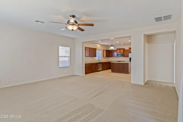a view of a kitchen with a sink and cabinet area