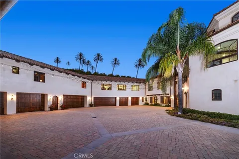 a view of a street with stores