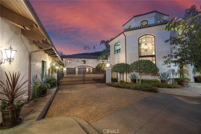 a view of a swimming pool with a yard