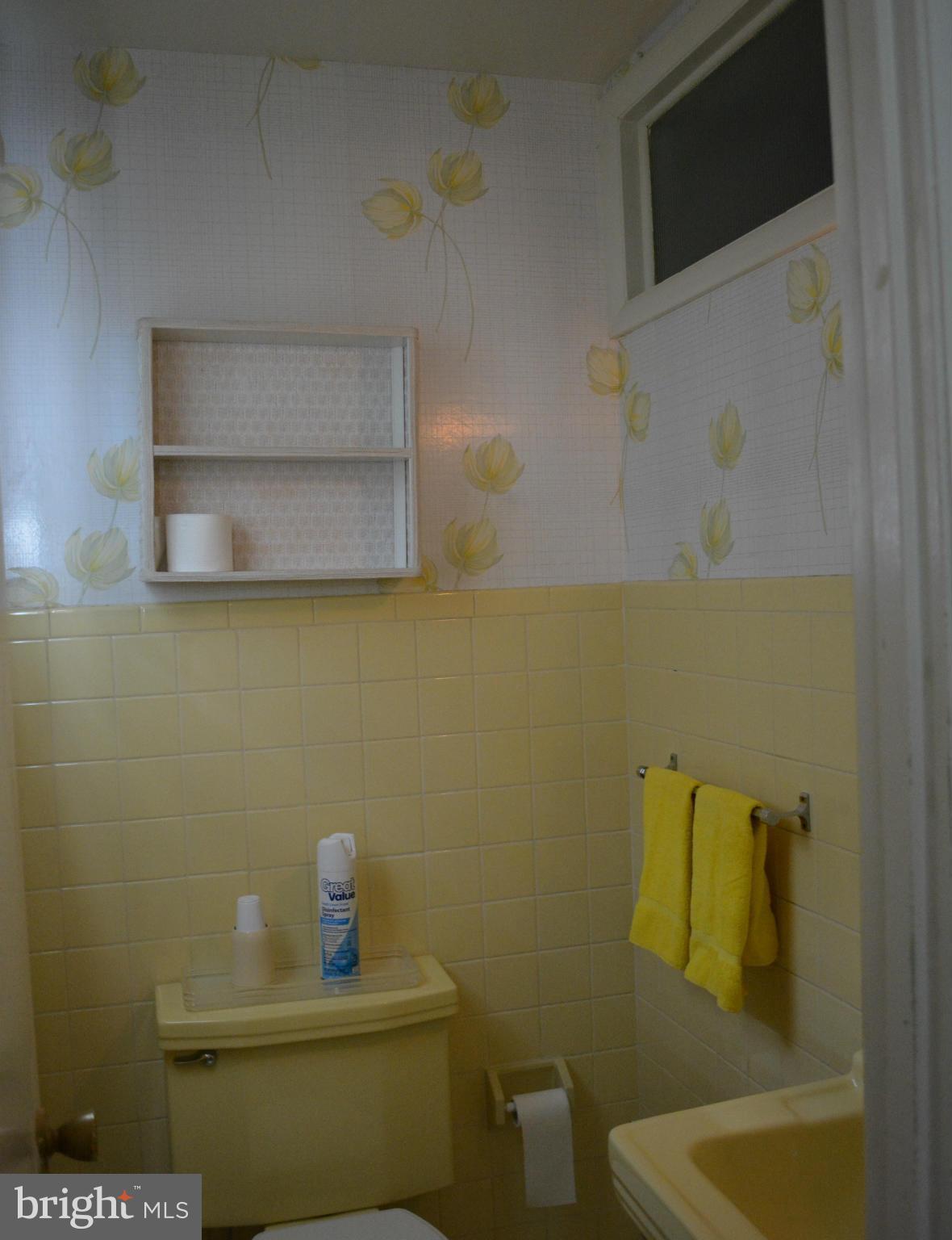 3709 Parkfield Road Baltimore, MD 21244 - Photo 12 of 23 a bathroom with a sink and a toilet