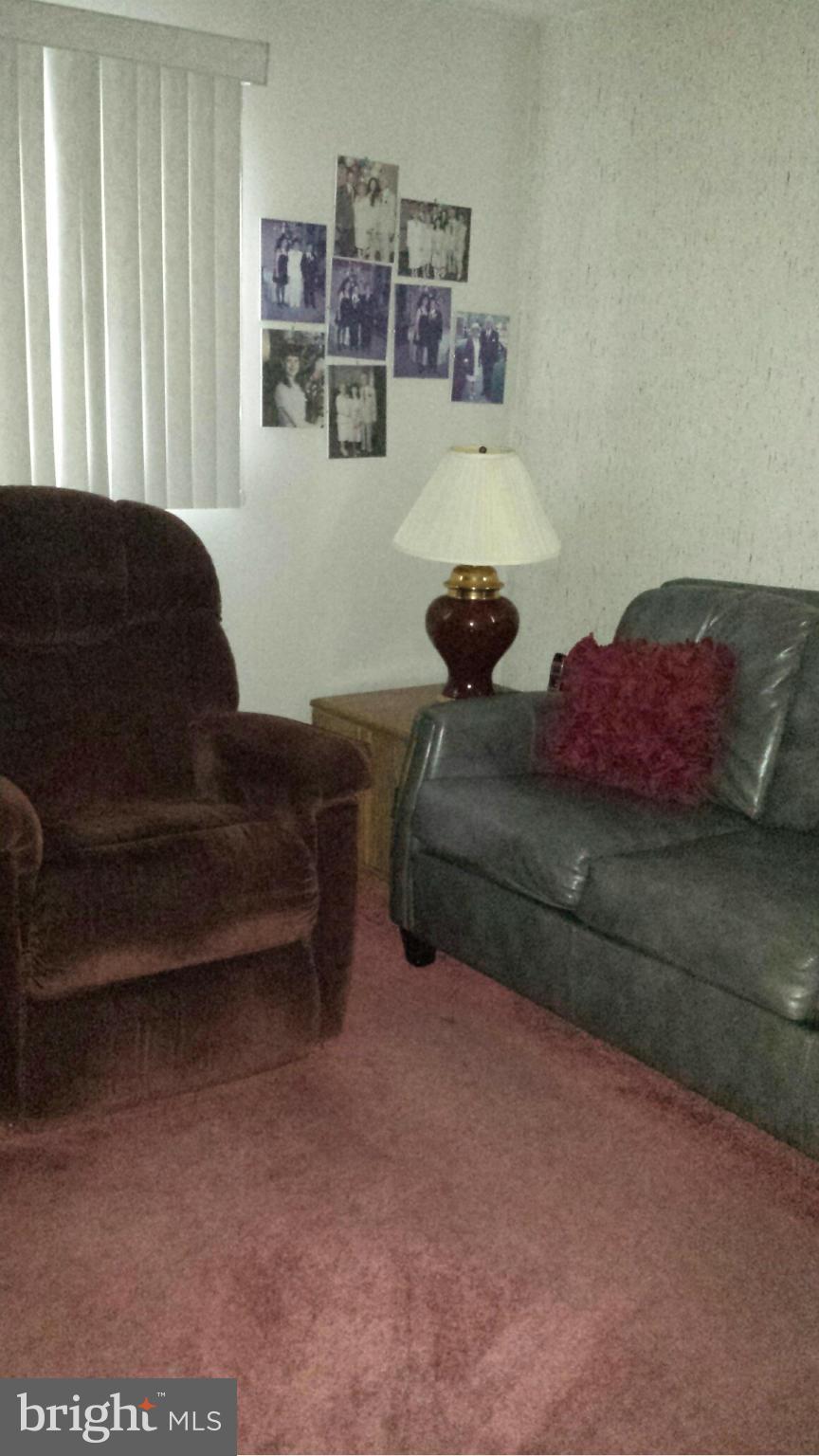 3709 Parkfield Road Baltimore, MD 21244 - Photo 15 of 23 a living room with furniture and a window
