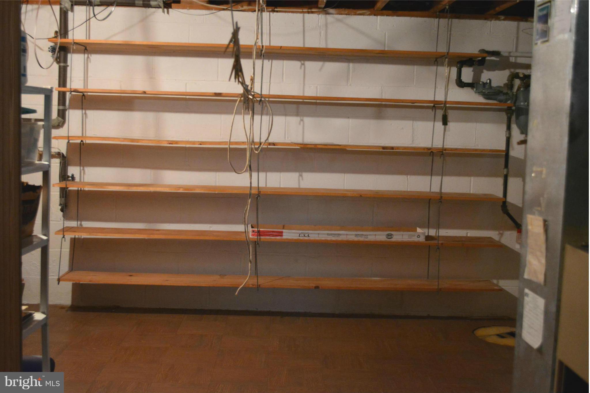 3709 Parkfield Road Baltimore, MD 21244 - Photo 17 of 23 a view of walk in closet with empty racks