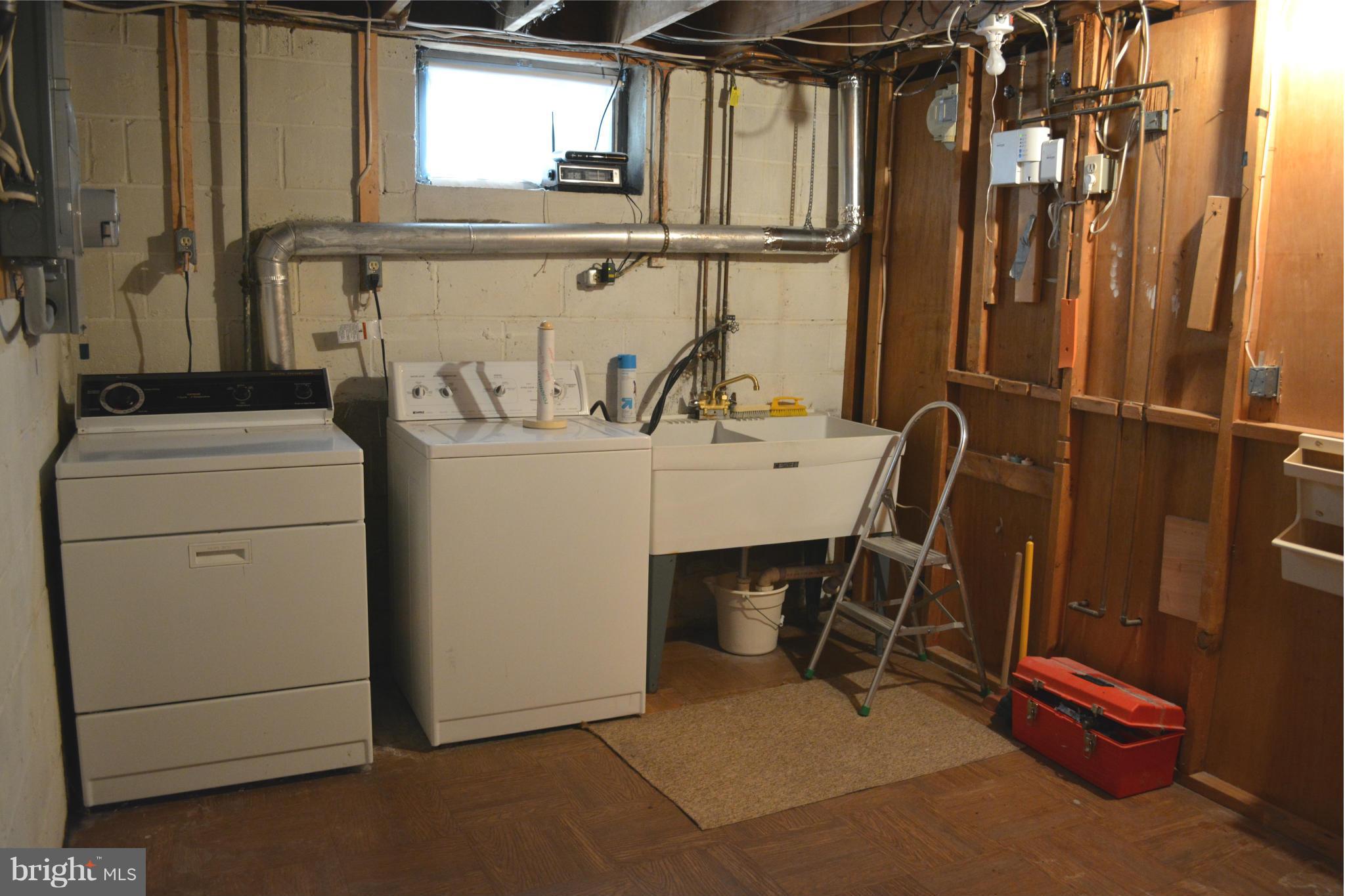 3709 Parkfield Road Baltimore, MD 21244 - Photo 18 of 23 a utility room with dryer and washer