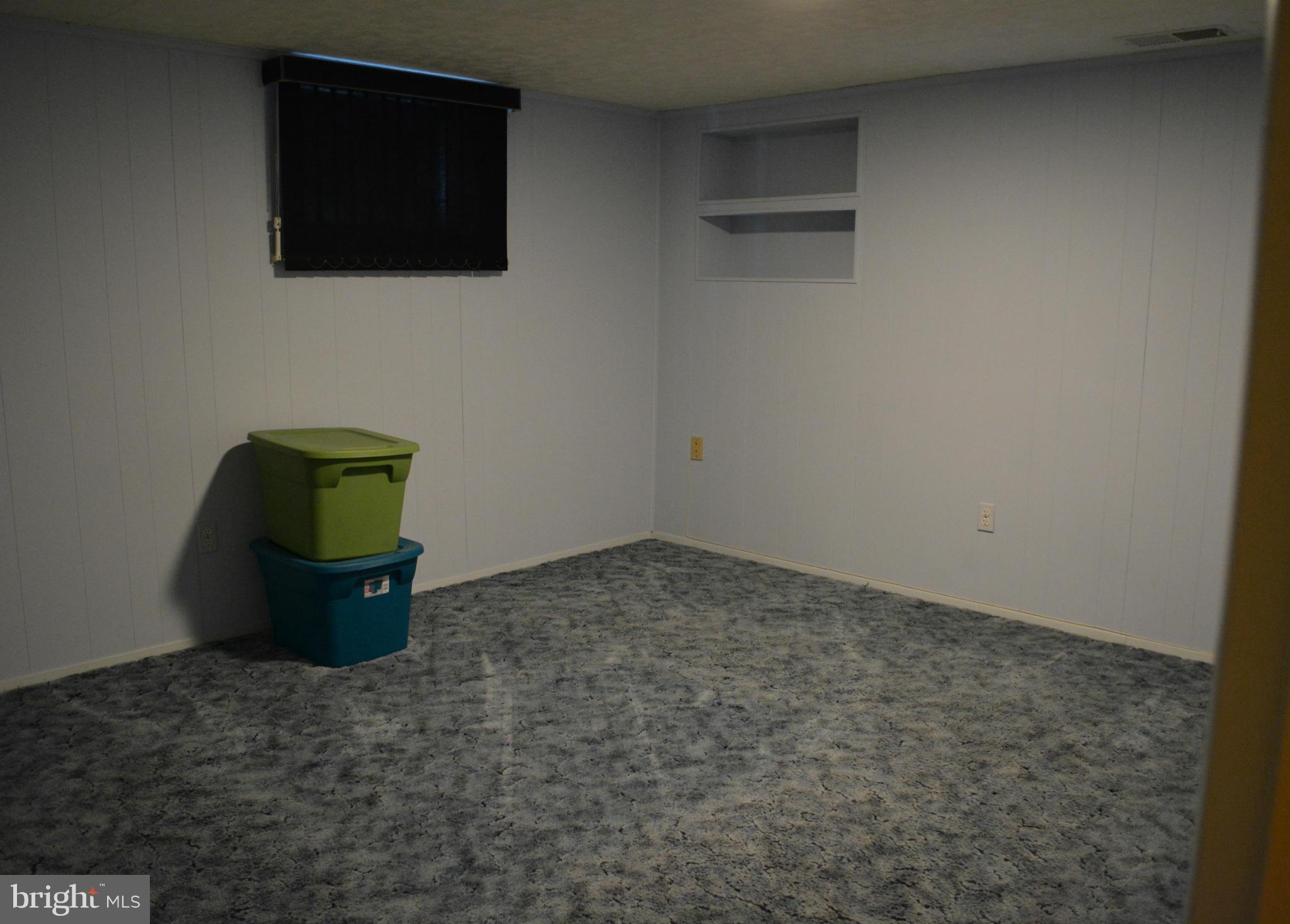3709 Parkfield Road Baltimore, MD 21244 - Photo 21 of 23 a room with a fireplace