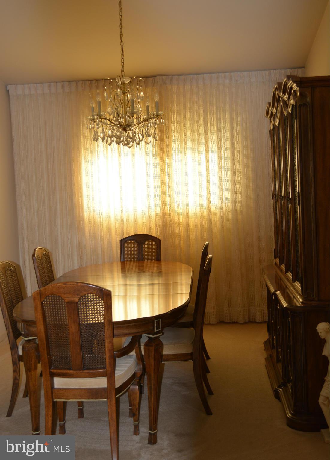 3709 Parkfield Road Baltimore, MD 21244 - Photo 4 of 23 a view of a dining room with furniture and window
