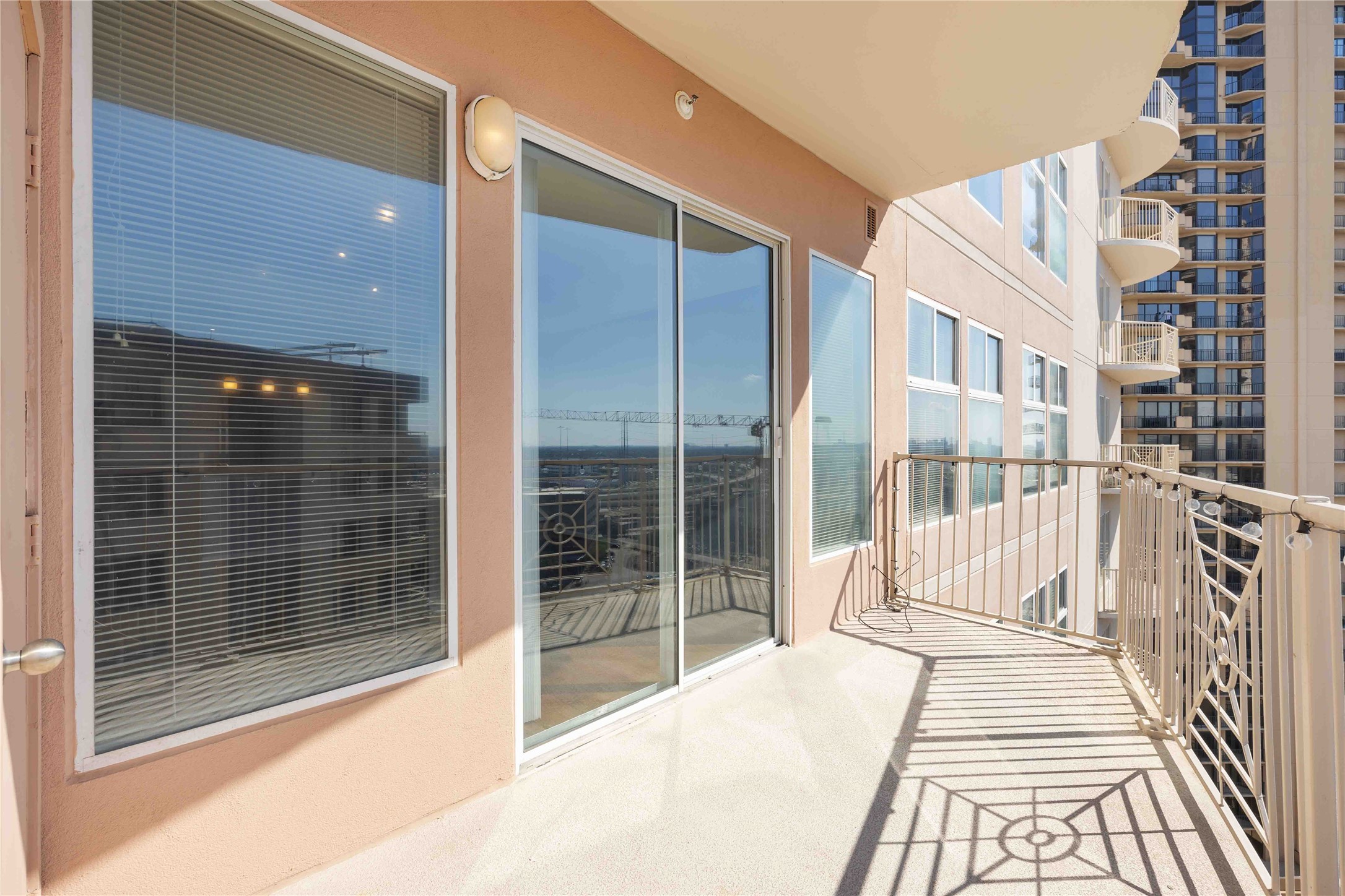 3505 Sage Road, Unit 1508 Houston, TX 77056 - Photo 11 of 23 Step outside onto your private balcony where glass sliding doors open to expand your living area and provide an outdoor spot to unwind after a busy day.