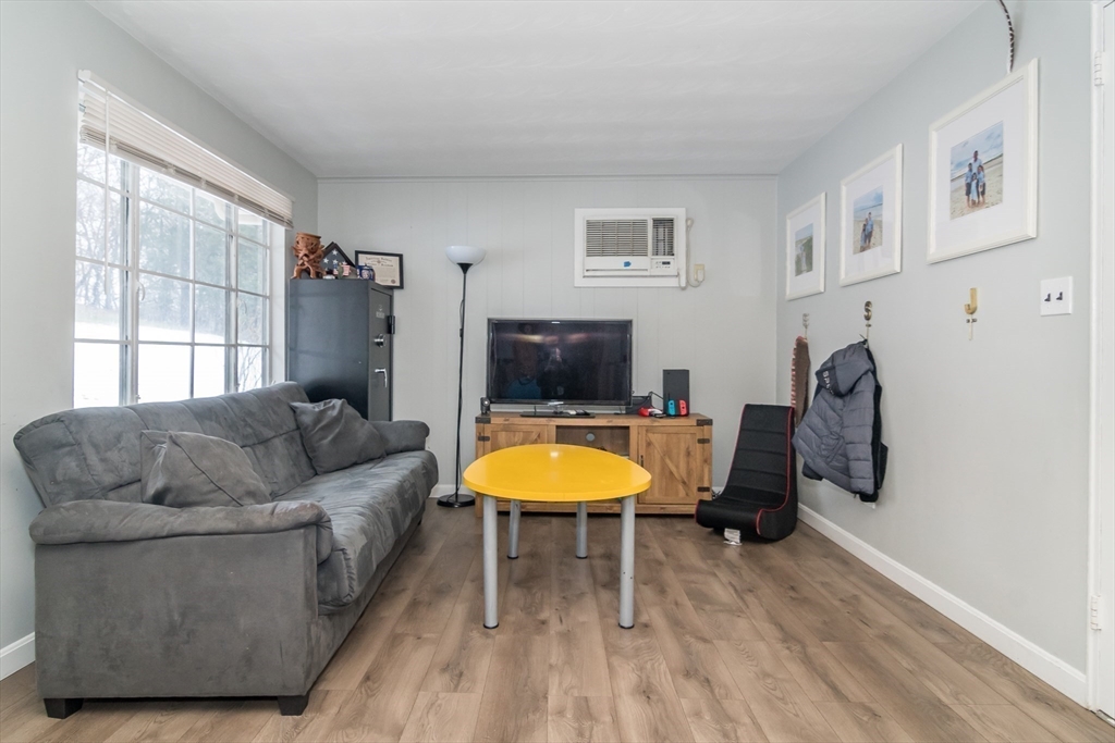 17 Francine Road Framingham, MA 01701 - Photo 8 of 14 a living room with furniture and a window