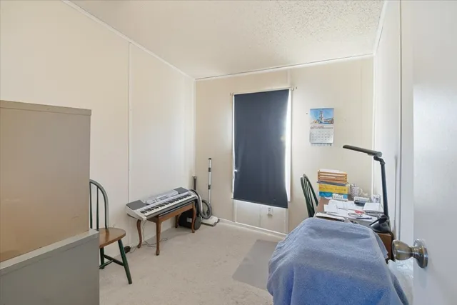 a view of a kitchen cabinets and wooden floor