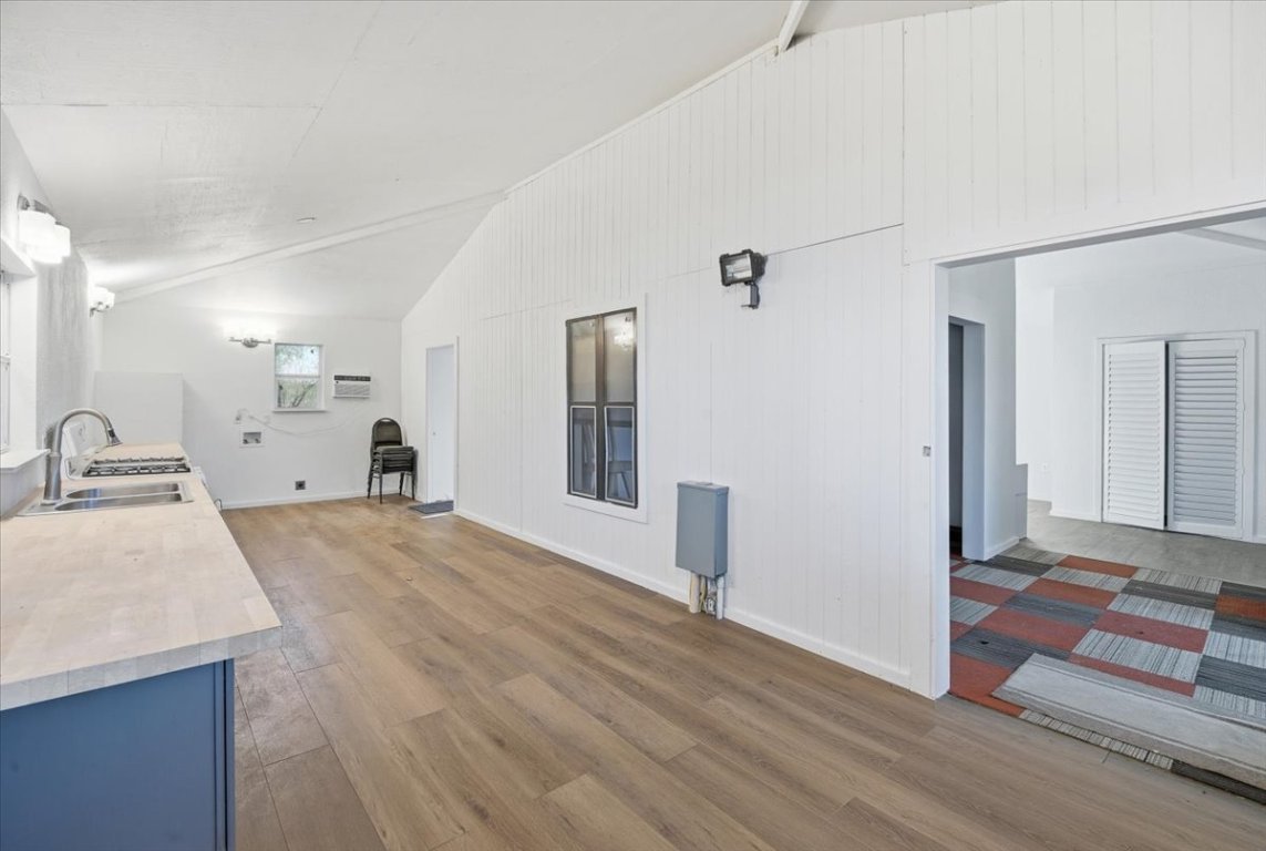 675 Highland Ranch Way Dale, TX 78616 - Photo 20 of 21 a view of a kitchen cabinets and wooden floor