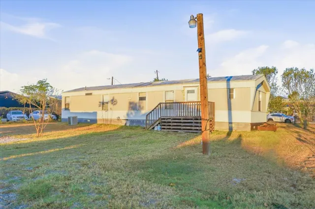a view of car in front of house