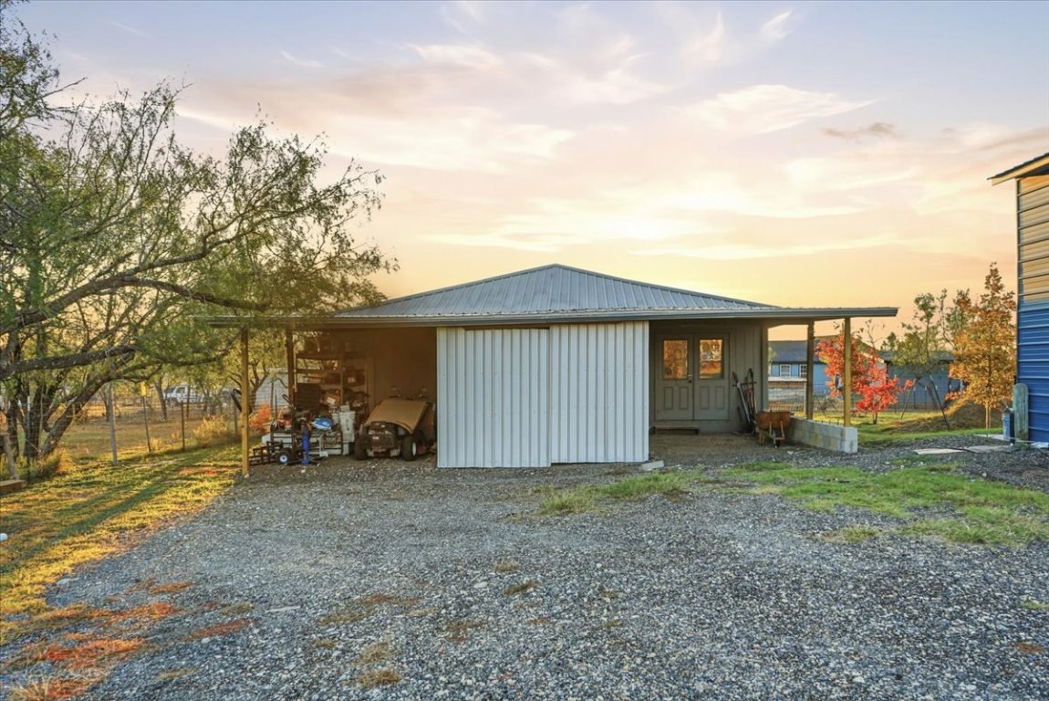675 Highland Ranch Way Dale, TX 78616 - Photo 5 of 21 a view of a house with a yard and garage
