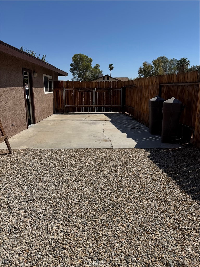 209 Kimberly Lane Ridgecrest, CA 93555 - Photo 13 of 62 a view of a backyard
