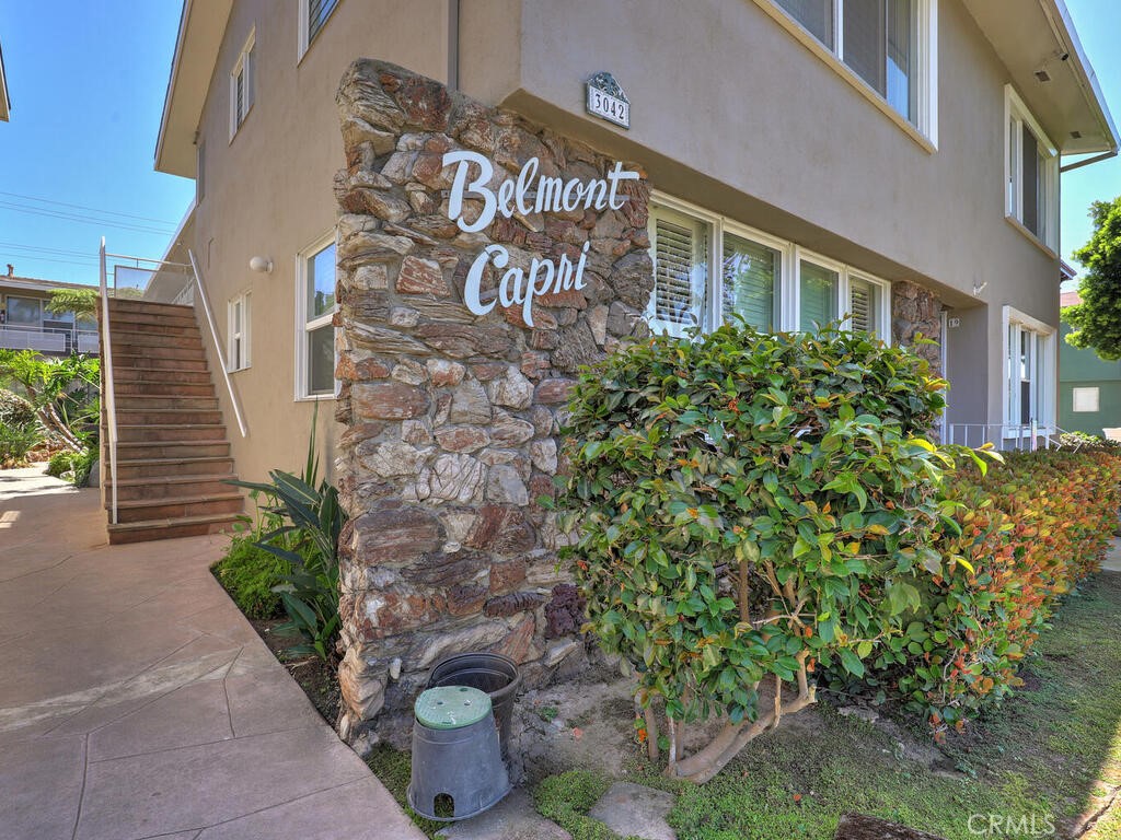 3042 East 3rd Street, Unit 5 Long Beach, CA 90814 - Photo 2 of 25 a sign on the side of a building