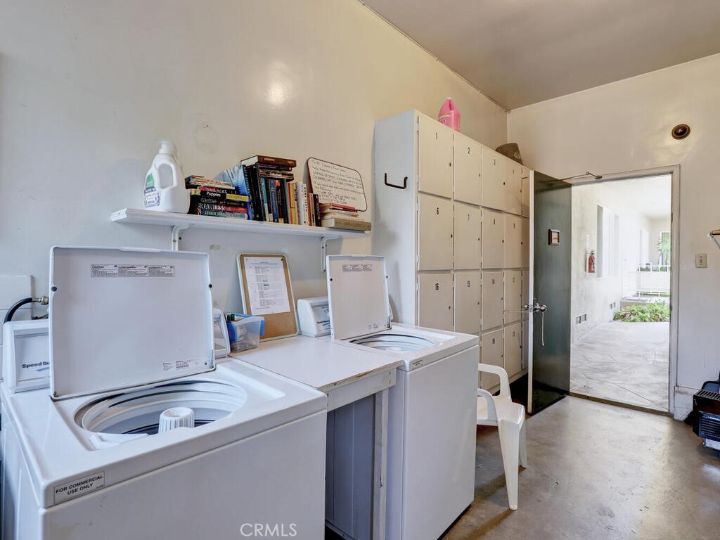 3042 East 3rd Street, Unit 5 Long Beach, CA 90814 - Photo 25 of 25 a room with a sink a bed and a refrigerator