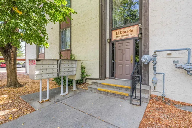 a view of backyard with a table and chair
