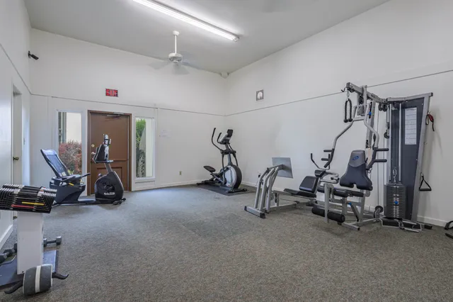 a view of a room with gym equipment