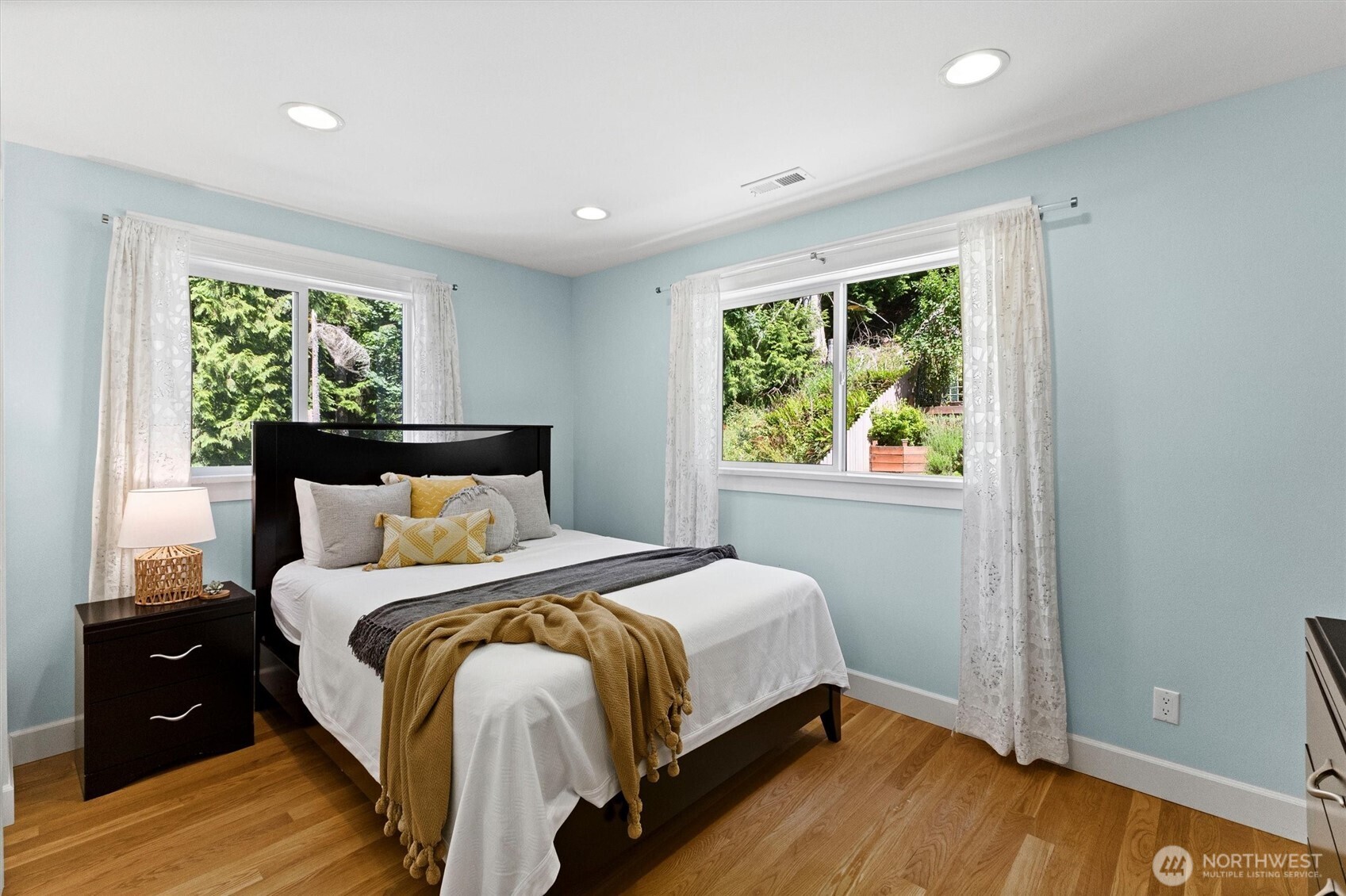 89 Grand View Lane Bellingham, WA 98229 - Photo 23 of 40 a bed sitting in a spacious bedroom next to a window