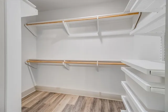 a view of an empty walk in closet