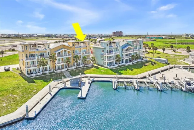 a view of a swimming pool with a lounge chair