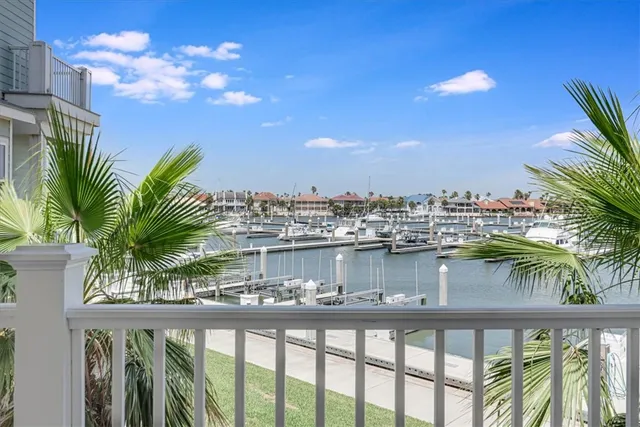 a view of a lake from a balcony