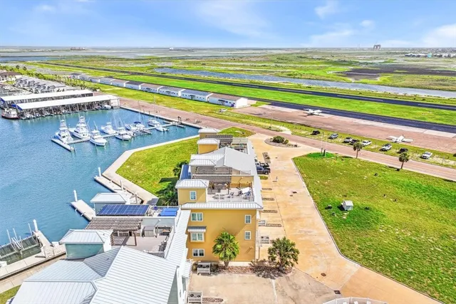 a view of an swimming pool with an outdoor seating